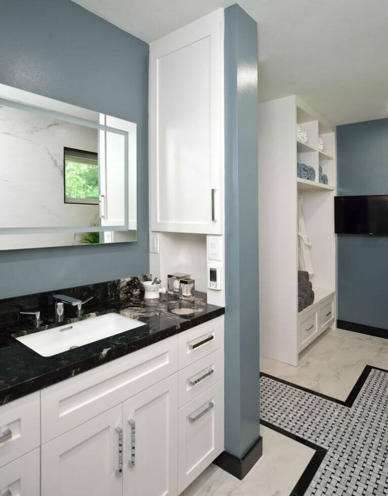 A blue and white kitchen and living area