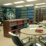 A beautiful office with full of bookshelf