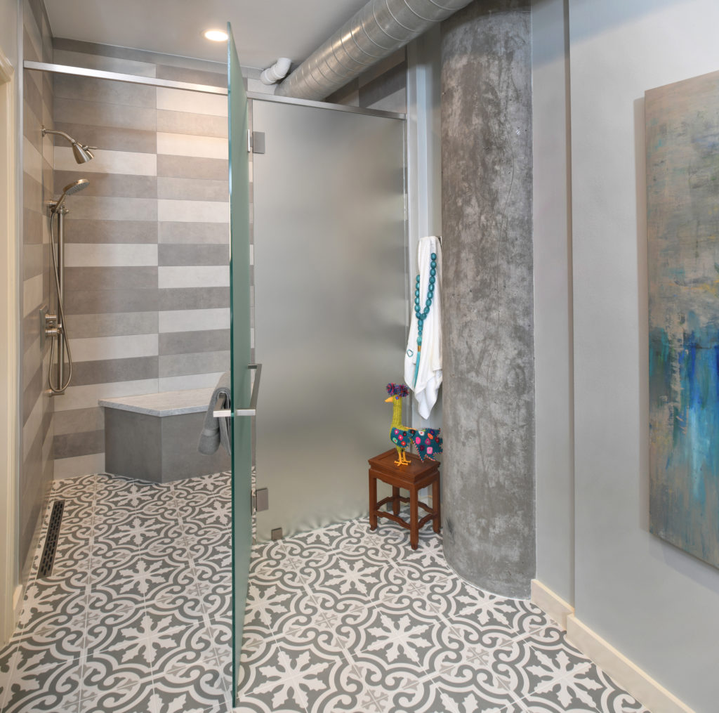 A bathroom with floral tiles