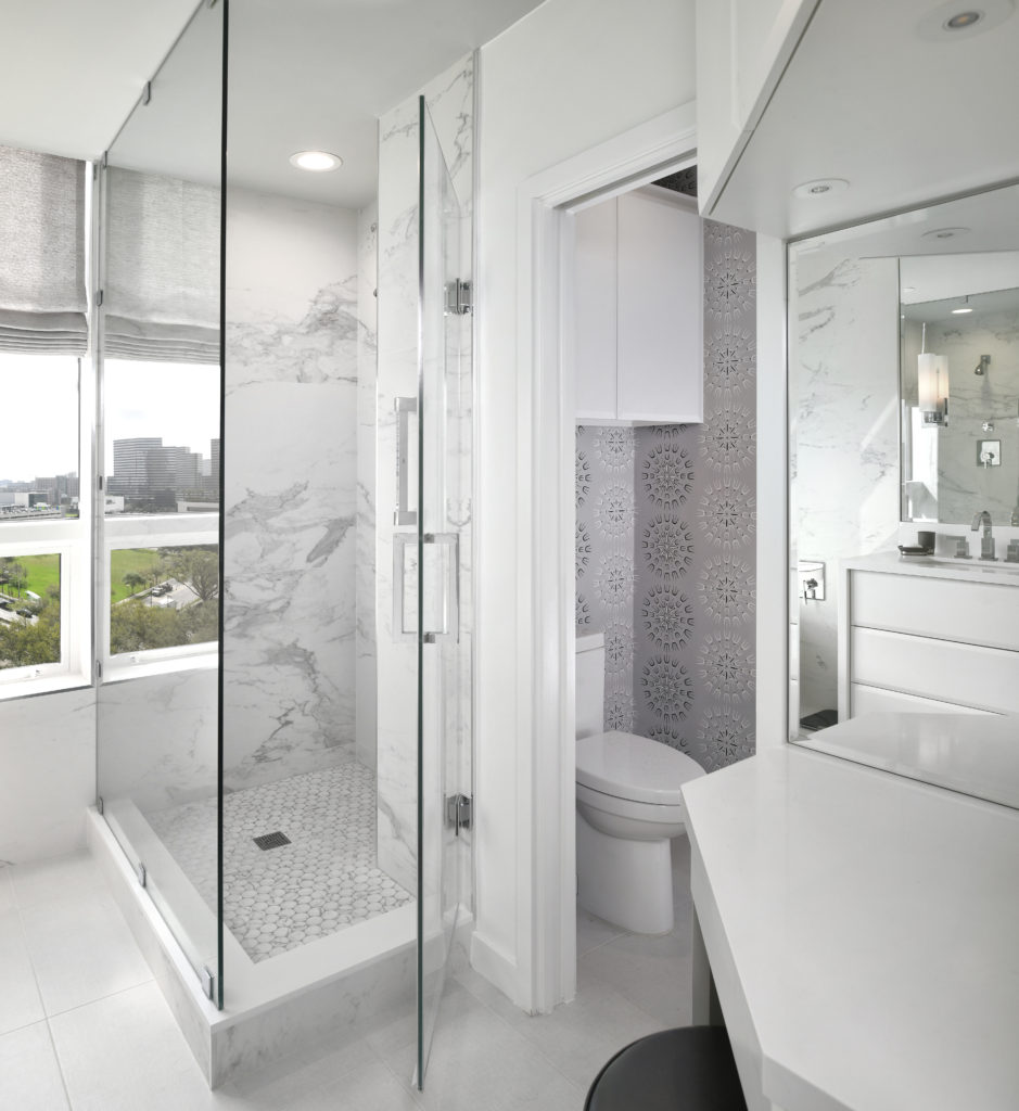 A clean bathroom with a white theme