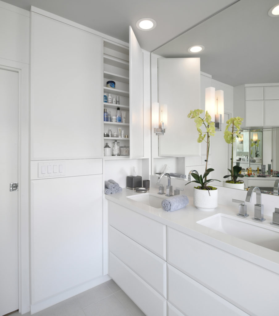 A bathroom cabinet and storage